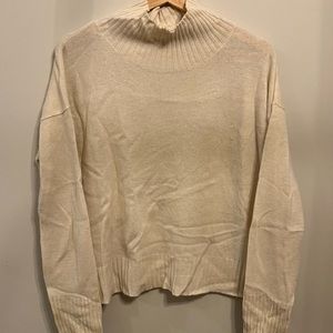 Free People cream turtle neck, gently worn Small